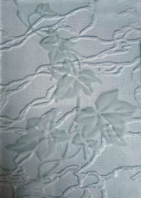 Пескоструйный рисунок на рифленом стекле.