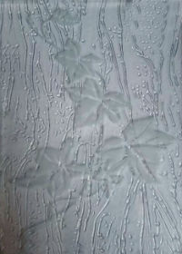 Пескоструйный рисунок на рифленом стекле.