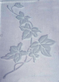 Пескоструйный рисунок на рифленом стекле.